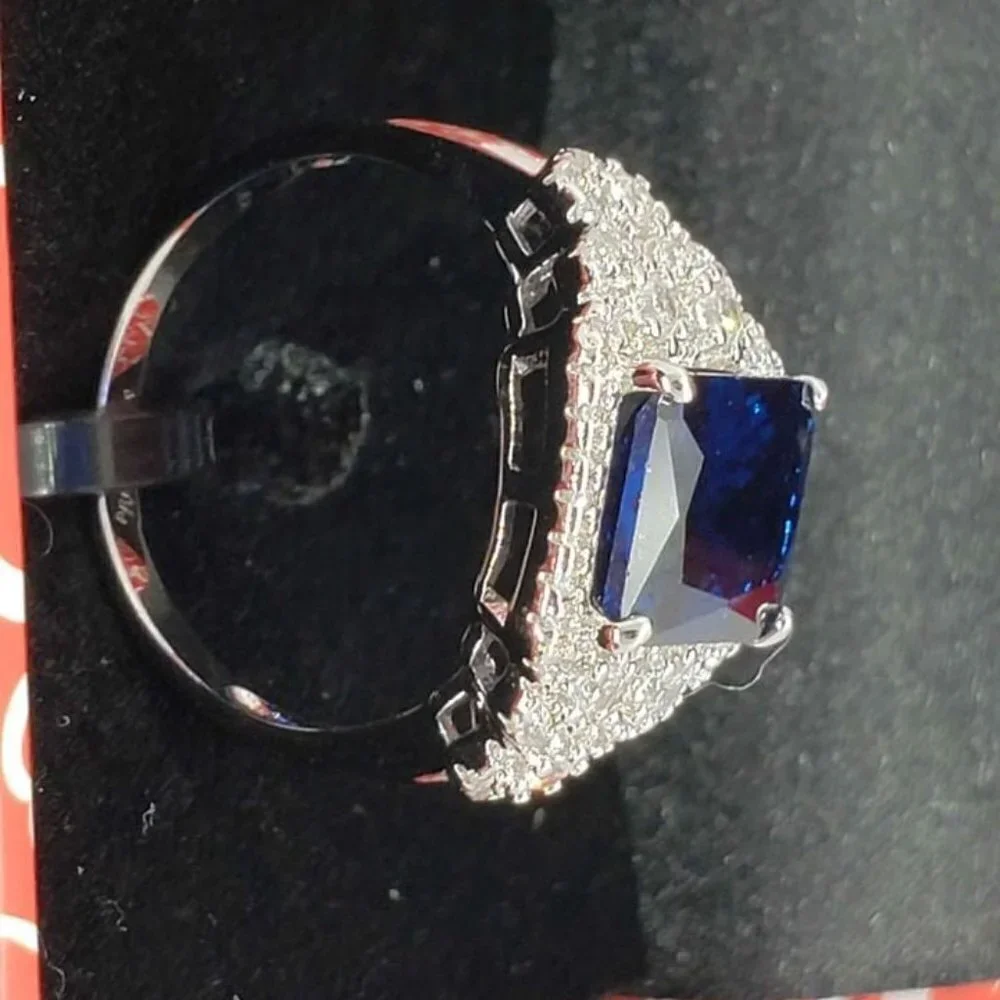 Brand New 18k White Gold Plated ring with cubic zirconia stones & blue gemstone